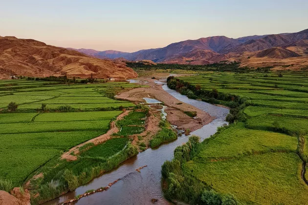 Photo of a river and green fields in the Qazvin Province of Iran
