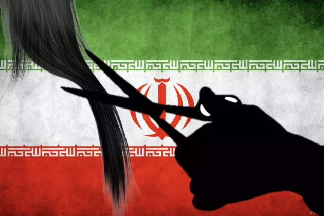 A silhoutte of a hand holding a pair of scissors and cutting a lock of hair in front of the Iranian flag